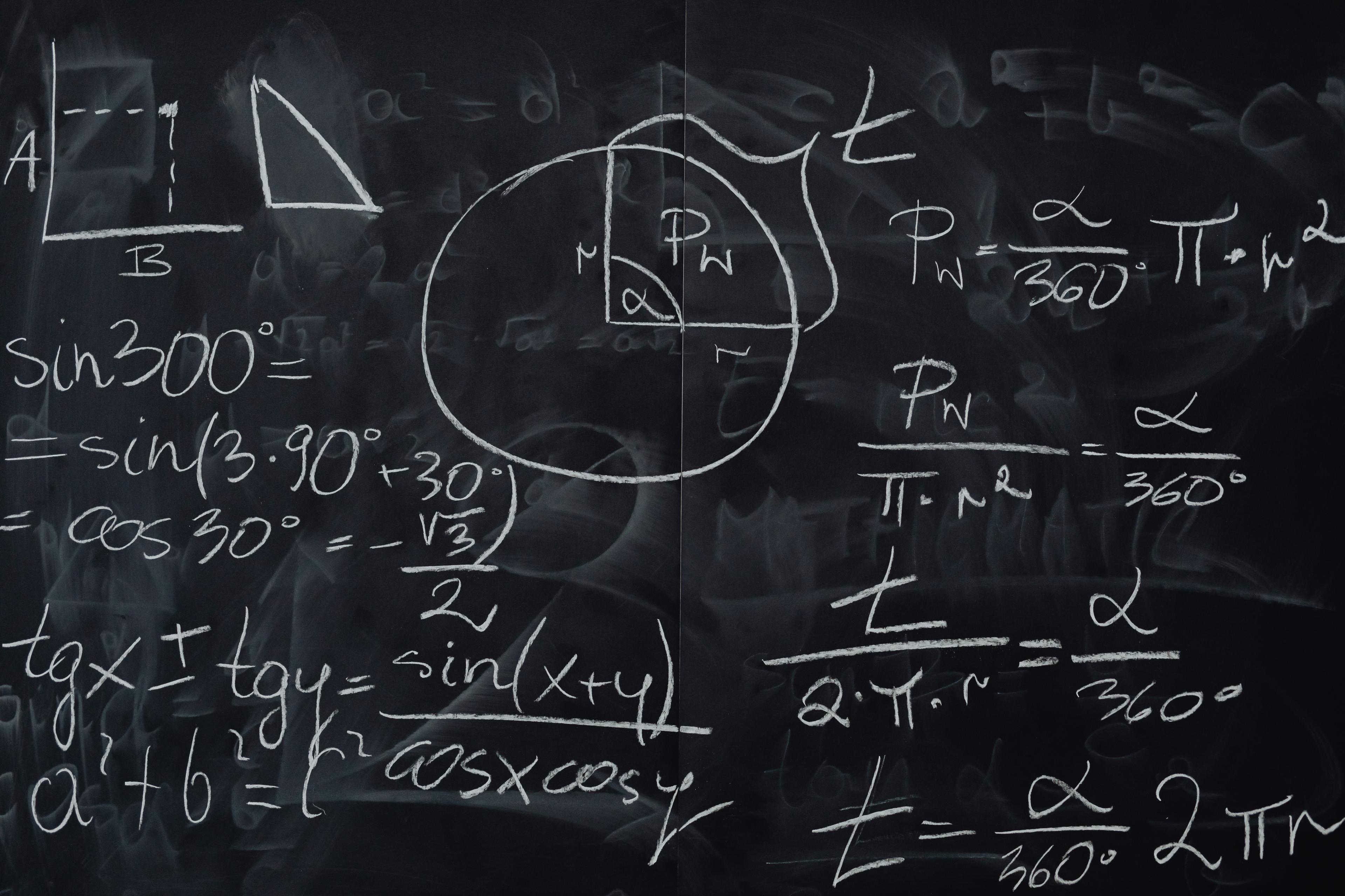 Mathematics equations written on a blackboard